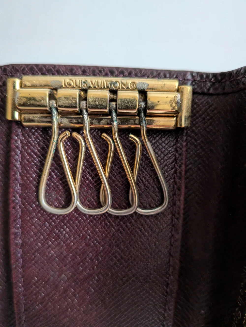 Louis Vuitton Burgundy Textured Leather Key Case